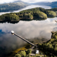 Illustration for article titled You Can Sleep In the Old Hydroelectric Plant In the Middle of This Lake